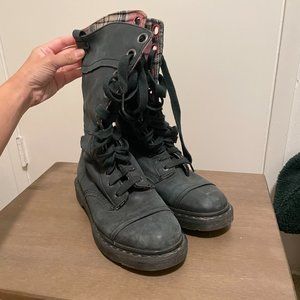 Dr. Martens black leather boots with plaid interior